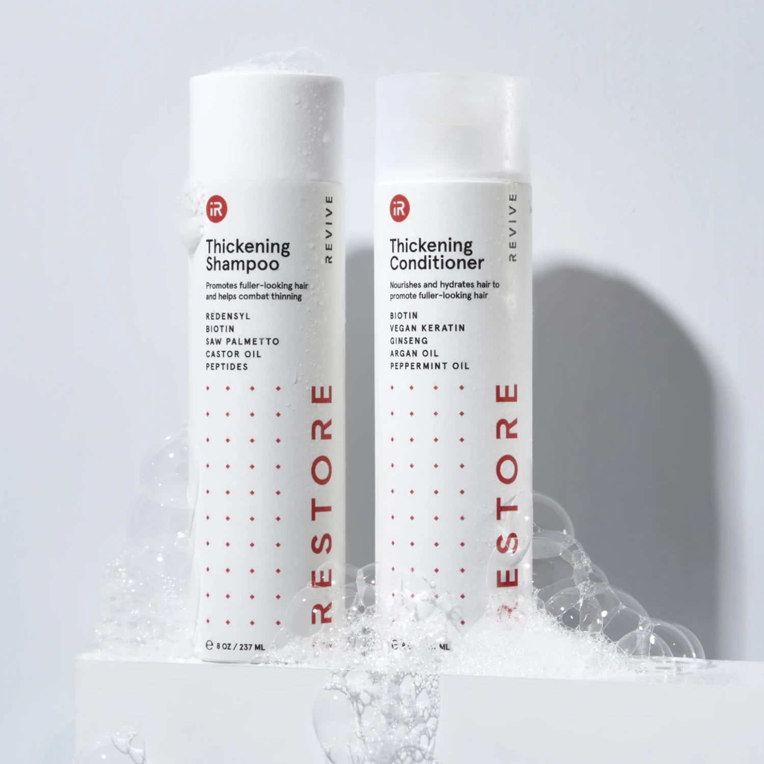 Thickening Shampoo and Thickening Conditioner with bubbles around